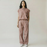 Capitandenim Nara Caramelo wide-leg trousers in a warm terracotta hue, made from a sustainable blend of linen, cotton, and TENCEL™ Lyocell.